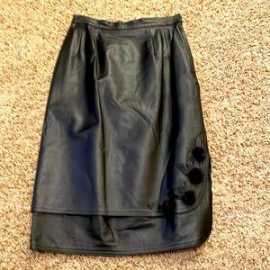 Vintage women’s black leather skirt